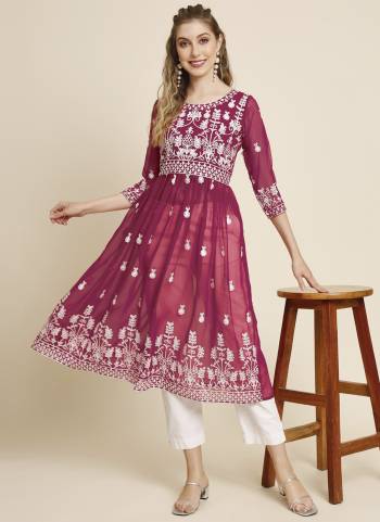 Garb These Beautiful Looking Readymade Anarkali Shape Kurti.These Kurti is Fabricated On Georgette.Its Beautified With Designer Thread Embroidery Work.