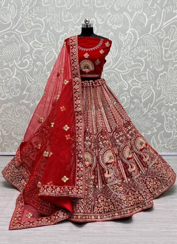 For A Designer Look,Grab These Lehenga Choli With Dupatta in Fine Colored.These Lehenga And Choli Are Velvet And Dupatta Are Fabricated On Soft Net Pair.Its Beautified With Designer Fancy Multy Thread,Dori,Mirror,Jari Embroidery Work.