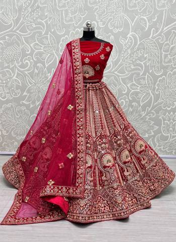 For A Designer Look,Grab These Lehenga Choli With Dupatta in Fine Colored.These Lehenga And Choli Are Velvet And Dupatta Are Fabricated On Soft Net Pair.Its Beautified With Designer Fancy Multy Thread,Dori,Mirror,Jari Embroidery Work.