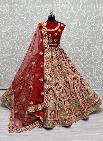 For A Designer Look,Grab These Lehenga Choli With Dupatta in Fine Colored.These Lehenga And Choli Are Velvet And Dupatta Are Fabricated On Soft Net Pair.Its Beautified With Designer Fancy Multy Thread,Dori Embroidery,Zarkan Diamond Work.