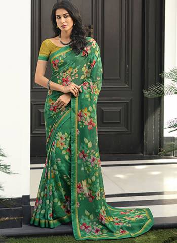 Garb These Party Wear Saree in Fine Colored.These Saree Are Georgette And Blouse is Fabricated On Malai Silk.Its Beautified With Designer Printed With Work Lace Border.