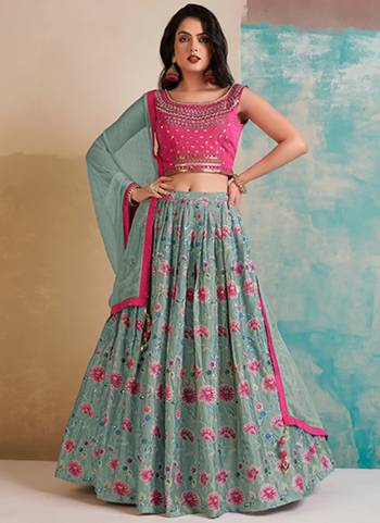 For A Designer Look,Grab These Lehenga Choli in Fine Colored.These Lehenga Are Chinon And Blouse Are Fabricated On Art Silk Pair With Georgette Dupatta.Its Beautified With Hand Embroidery Work With Printed.