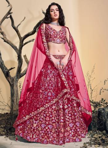 For A Designer Look,Grab These Lehenga Choli in Fine Colored.These Lehenga And Blouse Are Fabricated On Soft Net Pair With Soft Net Dupatta.Its Beautified With Heavy Thread Embroidery,Zarkan Stone Work.