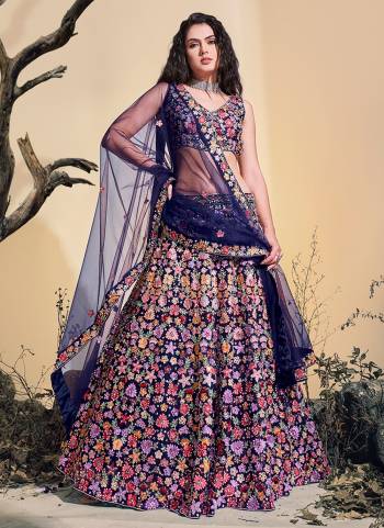 For A Designer Look,Grab These Lehenga Choli in Fine Colored.These Lehenga And Blouse Are Fabricated On Soft Net Pair With Soft Net Dupatta.Its Beautified With Heavy Thread Embroidery,Zarkan Stone Work.