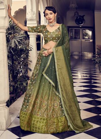 For A Designer Look,Grab These Lehenga Choli in Fine Colored.These Lehenga And Blouse Are Fabricated On Silk Pair With Organza Dupatta.Its Beautified With Printed,Thread,Sequance,Jari Embroidery Work.