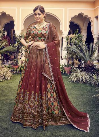 For A Designer Look,Grab These Lehenga Choli in Fine Colored.These Lehenga And Blouse Are Fabricated On Silk Pair With Organza Dupatta.Its Beautified With Printed,Thread,Sequance,Jari Embroidery Work.