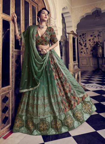 For A Designer Look,Grab These Lehenga Choli in Fine Colored.These Lehenga And Blouse Are Fabricated On Silk Pair With Organza Dupatta.Its Beautified With Printed,Thread,Sequance,Jari Embroidery Work.