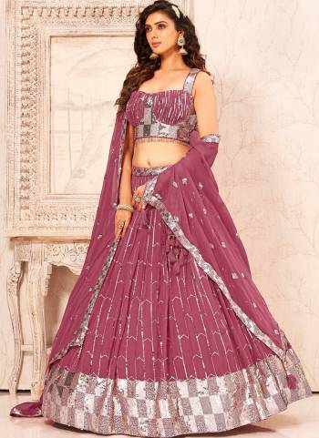 For A Designer Look,Grab These Lehenga Choli in Fine Colored.These Lehenga And Blouse Are Fabricated On Faux Georgette Pair With Faux Georgette Dupatta.Its Beautified With Heavy Designer Embroidery Work.