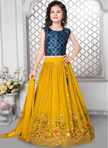 For A Designer Look,Grab These Kidswear Readymade Lehenga Choli in Fine Colored.These Choli Are Fabricated On Banglori Pair With Faux Georgette Lehenga And Dupatta.Its Beautified With Designer Thread,Sequance Embroidery Work.