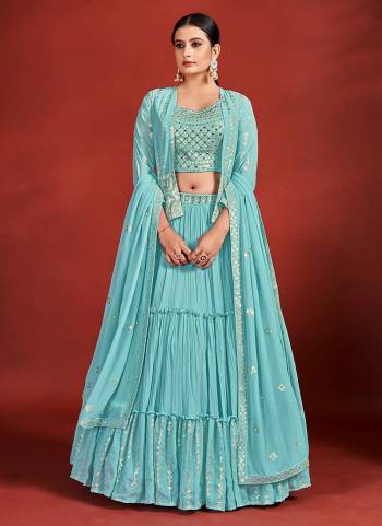 For A Designer Look,Grab These Lehenga Choli With Jacket in Fine Colored.These Lehenga And Blouse Are Fabricated On Georgette Pair With Georgette Dupatta And Jacket.Its Beautified With Designer Sequance,Mirror Embroidery Work.