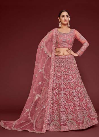 For A Designer Look,Grab These Lehenga Choli in Fine Colored.These Lehenga And Dupatta Are Fabricated On Soft Net Pair With Soft Net Blouse.Its Beautified With Designer Thread,Jari,Dori,Badla Embroidery Work.