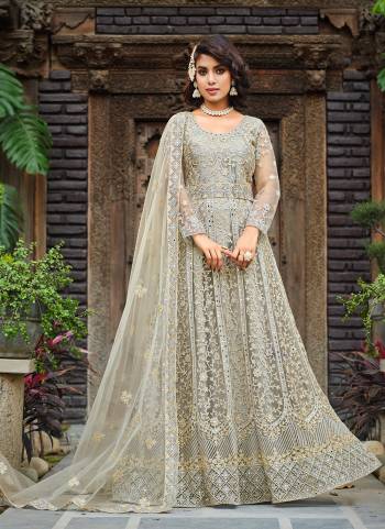 Grab These Anarkali Suit in Fine Colored Pair With Bottom And Dupatta.These Top And Dupatta Are Fabricated On Butterfly Net Pair With Japan Satin Bottom.Its Beautified With Heavy Designer Embroidery With Stone Work.