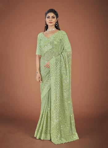 Garb These Party Wear Saree in Fine Colored.These Saree And Blouse is Fabricated On Georgette.Its Beautified With Designer Thread,Sequance  Embroidery Work.