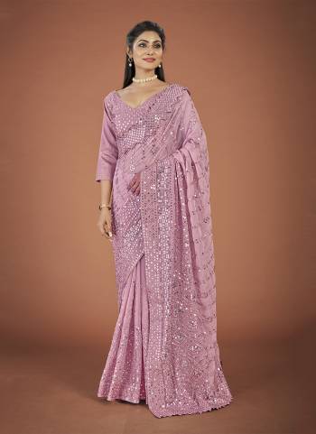 Garb These Party Wear Saree in Fine Colored.These Saree And Blouse is Fabricated On Georgette.Its Beautified With Designer Thread,Sequance  Embroidery Work.