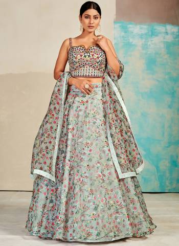 For A Designer Look,Grab These Lehenga Choli in Fine Colored.These Lehenga And Blouse Are Fabricated On Organza Pair With Organza Dupatta.Its Beautified With Digital Printed,Mirror,Thread Embroidery Work.