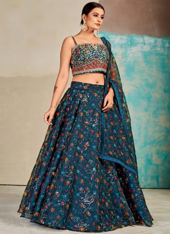 For A Designer Look,Grab These Lehenga Choli in Fine Colored.These Lehenga And Blouse Are Fabricated On Organza Pair With Organza Dupatta.Its Beautified With Digital Printed,Mirror,Thread Embroidery Work.