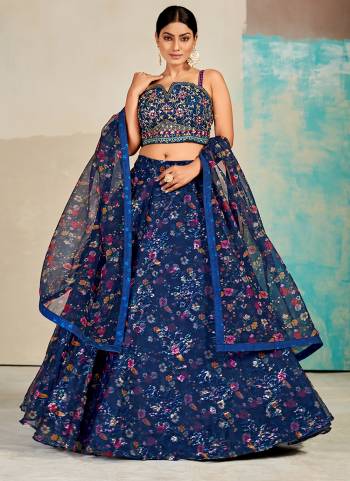 For A Designer Look,Grab These Lehenga Choli in Fine Colored.These Lehenga And Blouse Are Fabricated On Organza Pair With Organza Dupatta.Its Beautified With Digital Printed,Mirror,Thread Embroidery Work.