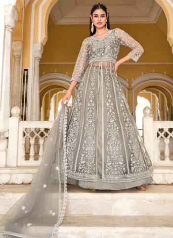 Grab These Suit in Fine Colored Pair With Bottom And Dupatta.These Top And Dupatta Are Fabricated On Butterfly Net Pair With Satin Bottom.Its Beautified With Heavy Designer Coding Embroidery,Stone Work.