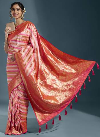 Grab These Party Wear Saree in Fine Colored.These Saree And Blouse is Fabricated On Satin Silk.Its Beautified With Wevon Laheriya Designer Work.