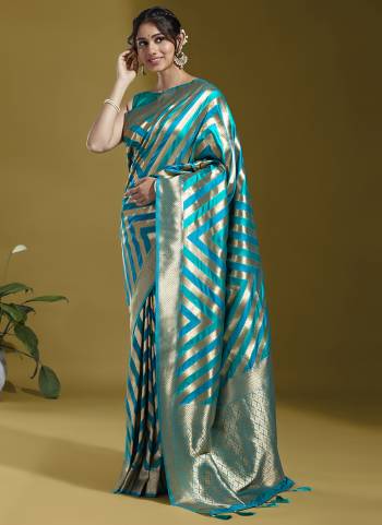 Grab These Fastival Wear Saree in Fine Colored.These Saree And Blouse is Fabricated On Satin Silk.Its Beautified With Wevon Laheriya Designer Work.