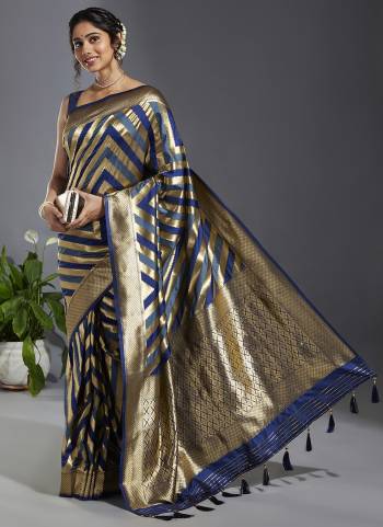 Grab These Fastival Wear Saree in Fine Colored.These Saree And Blouse is Fabricated On Satin Silk.Its Beautified With Wevon Laheriya Designer Work.