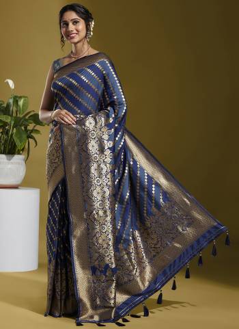 Grab These Fastival Wear Saree in Fine Colored.These Saree And Blouse is Fabricated On Satin Silk.Its Beautified With Wevon Banarasi Designer Work.