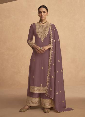 Garb These Designer Plazzo Suits in Fine Colored Pair With Dupatta.These Top Are Georgette And Dupatta Are Fabricated On Georgette Pair With Georgette Bottom.Its Beautified With Heavy Designer Sequance,Jari Embroidery Work.