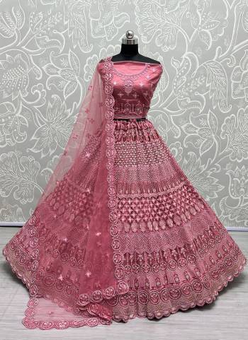 For A Fancy Designer Look,Grab These Lehenga Choli With Dupatta in Fine Colored.These Lehenga And Choli Are Heavy Net And Dupatta Are Fabricated On Soft Net Pair.Its Beautified With Designer Fancy Multy Thread,Rainbow Sequance Embroidery,Diamond Work.