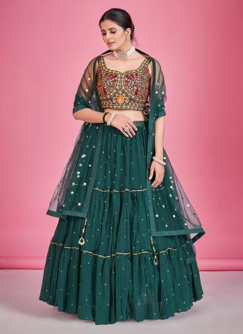 For A Designer Look,Grab These Lehenga Choli in Fine Colored.These Lehenga And Blouse Are Fabricated On Georgette Pair With Soft Net Dupatta.Its Beautified With Thread,Mirror,Sequance Embroidery Work.