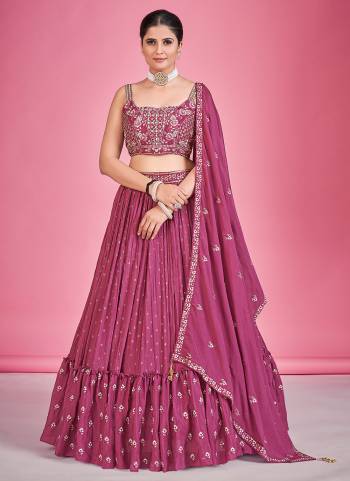 For A Designer Look,Grab These Lehenga Choli in Fine Colored.These Lehenga And Blouse Are Fabricated On Georgette Pair With Georgette Dupatta.Its Beautified With Thread,Mirror Embroidery Work.