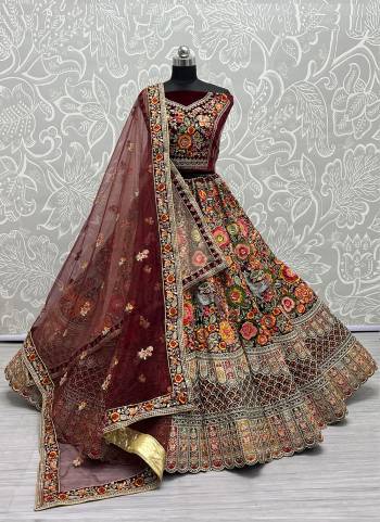 For A Fancy Designer Look,Grab These Lehenga Choli With Dupatta in Fine Colored.These Lehenga And Choli Are Velvet And Dupatta Are Fabricated On Soft Net Pair.Its Beautified With Designer Fancy Multy Thread,Dori,Sequance Embroidery,Diamond Work.