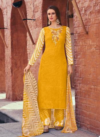 Looking These Suit in Fine Colored Pair With Bottom And Dupatta.These Top Are Cotton Satin And Dupatta Are Fabricated On Cotton Mal Pair With Cambric Cotton Bottom.Its Beautified With Designer Printed With Embroidery Work.