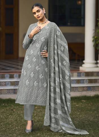 Garb These Suit in Fine Colored Pair With Bottom And Dupatta.These Top Are Cambric Cotton And Dupatta Are Fabricated On Cotton Mal Pair With Cambric Cotton Bottom.Its Beautified With Designer Position Printed With Thread Embroidery Work.