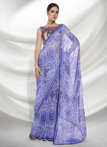 Grab These Party Wear Saree in Fine Colored.These Saree is Fabricated On Weightless Pair With Art Silk Blouse.Its Beautified With Designer Printed Work.