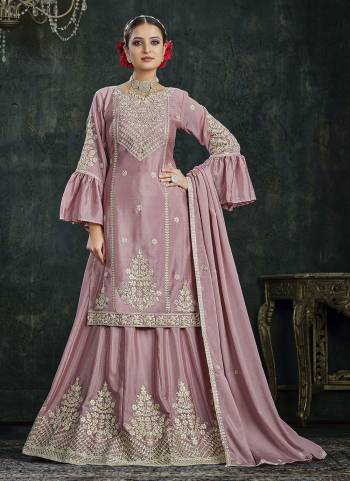 Grab These Lehenga Suit in Fine Colored Pair With Bottom And Dupatta.These Top Are Chinon And Dupatta Are Fabricated On Chinon Pair With Chinon Bottom.Its Beautified With Santoon Inner.Its Beautified With Designer Heavy Embroidery Work.