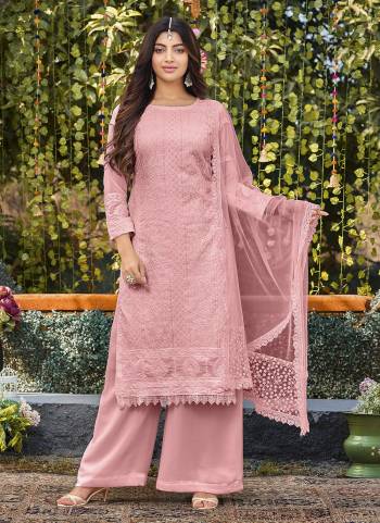 Attrective Looking These Plazzo Suit in Fine Colored Pair With Bottom And Dupatta.These Top And Bottom Are Faux Georgette And Dupatta Are Fabricated On Net Pair.Its Beautified With Heavy Designer Cotton Thread Embroidery Work.