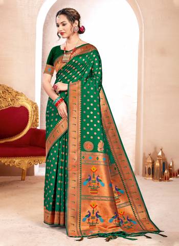 Looking These Party Wear Saree in Fine Colored.These Saree And Blouse is Fabricated On Paithani Silk.Its Beautified With Weavon Jari Designer.