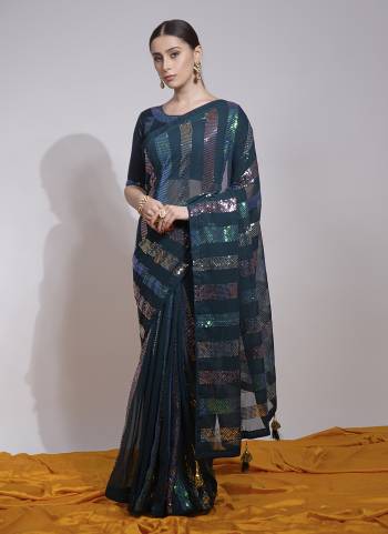 Garb These Fancy Saree in Fine Colored.These Saree Are Georgette And Blouse is Mono Banglori Fabricated.Its Beautified With Designer Sequance Embroidery Work.