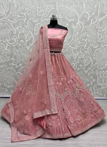 For A Fancy Designer Look,Grab These Lehenga Choli With Dupatta in Fine Colored.These Lehenga And Choli Are Heavy Net And Dupatta Are Fabricated On Soft Net Pair.Its Beautified With Designer Fancy Multy Thread,Rainbow Sequance Embroidery,Diamond Work.