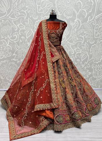 For A Fancy Heavy Designer Look,Grab These Lehenga Choli With Dupatta in Fine Colored.These Lehenga And Choli Are Velvet And Dupatta Are Fabricated On Velvet And Soft Net Pair.Its Beautified With Designer Patch Work,Fancy Multy Thread, Sequance Embroidery,Zarkan Diamond Work.