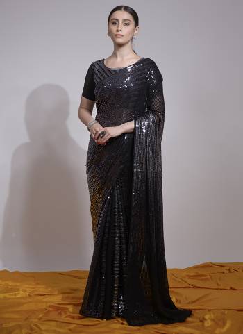 Attrective Look These Party Wear Saree in Fine Colored.These Saree Are Georgette And Blouse is Satin Banglori Fabricated.Its Beautified With Designer Sequance Embroidery Work.