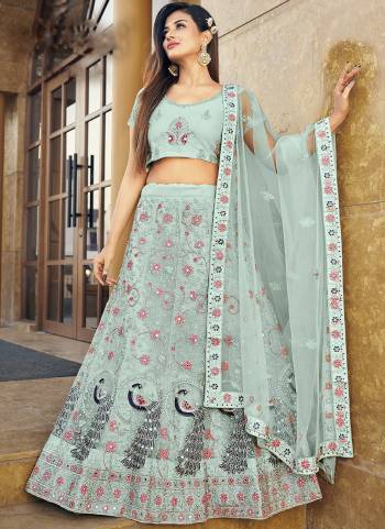 Garb This Partywear Fine Color Heavy Designer Lehemga Choli Fabric Are Soft Net And And Dupatta Soft Net In Fabricated Beautified With Attrective Reaham,Real Mirror Embroidery,Diamond Work. Buy Now.