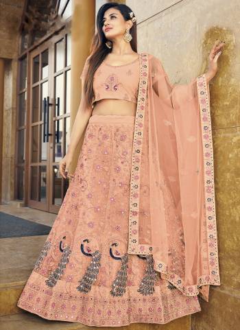 Garb This Partywear Fine Color Heavy Designer Lehemga Choli Fabric Are Soft Net And And Dupatta Soft Net In Fabricated Beautified With Attrective Reaham,Real Mirror Embroidery,Diamond Work. Buy Now.