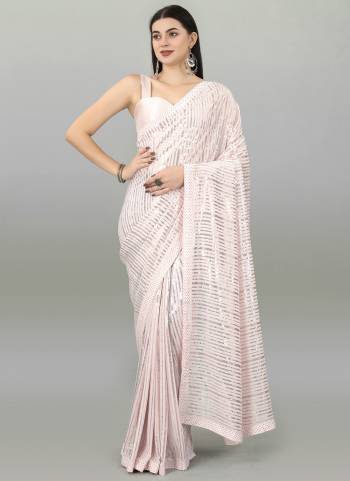 Garb These Fancy Saree in Fine Colored.These Saree Are Georgette And Blouse is Mono Banglori Fabricated.Its Beautified With Designer Sequance Embroidery Work.