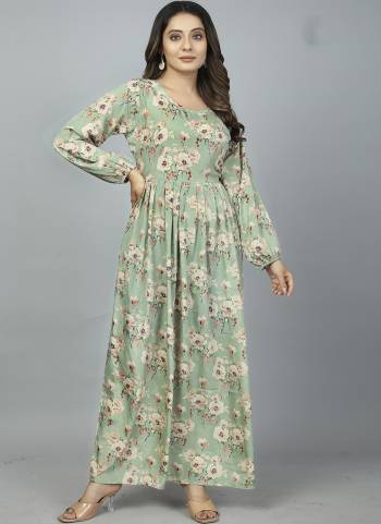 Attrective Looking These Beautiful Looking Readymade Gown .These Gown is Fabricated On Kasturi Silk.Its Beautified With Designer Floral Printed.