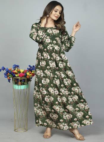 Attrective Looking These Beautiful Looking Readymade Gown .These Gown is Fabricated On Kasturi Silk.Its Beautified With Designer Floral Printed.