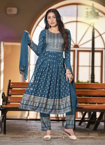 Grab These Beautiful Looking Readymade Suits.These Top And Bottom is Fabricated On Rayon And Dupatta Are Nazmin.Its Beautified With Designer Printed With Embroidery.