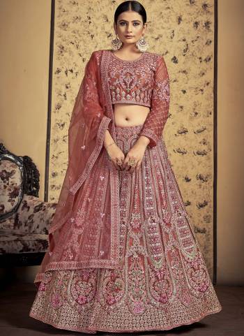 For A Designer Look,Grab These Lehenga Choli in Fine Colored.These Lehenga And Blouse Are Fabricated On Soft Net Pair With Soft Net Dupatta.Its Beautified With Dori Embroidery,Stone Work.