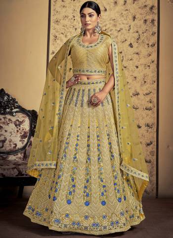 For A Designer Look,Grab These Lehenga Choli in Fine Colored.These Lehenga And Blouse Are Fabricated On Soft Net Pair With Soft Net Dupatta.Its Beautified With Dori Embroidery,Stone Work.