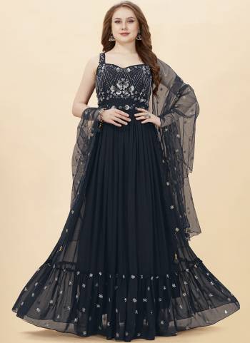 Attrective Looking These Designer Gown in Fine Colored Pair With Dupatta.These Gown Are Faux Georgette And Dupatta Are Fabricated On Net Pair.Its Beautified With Heavy Designer Embroidery,Hand Work.